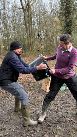 Darrell watering the plants